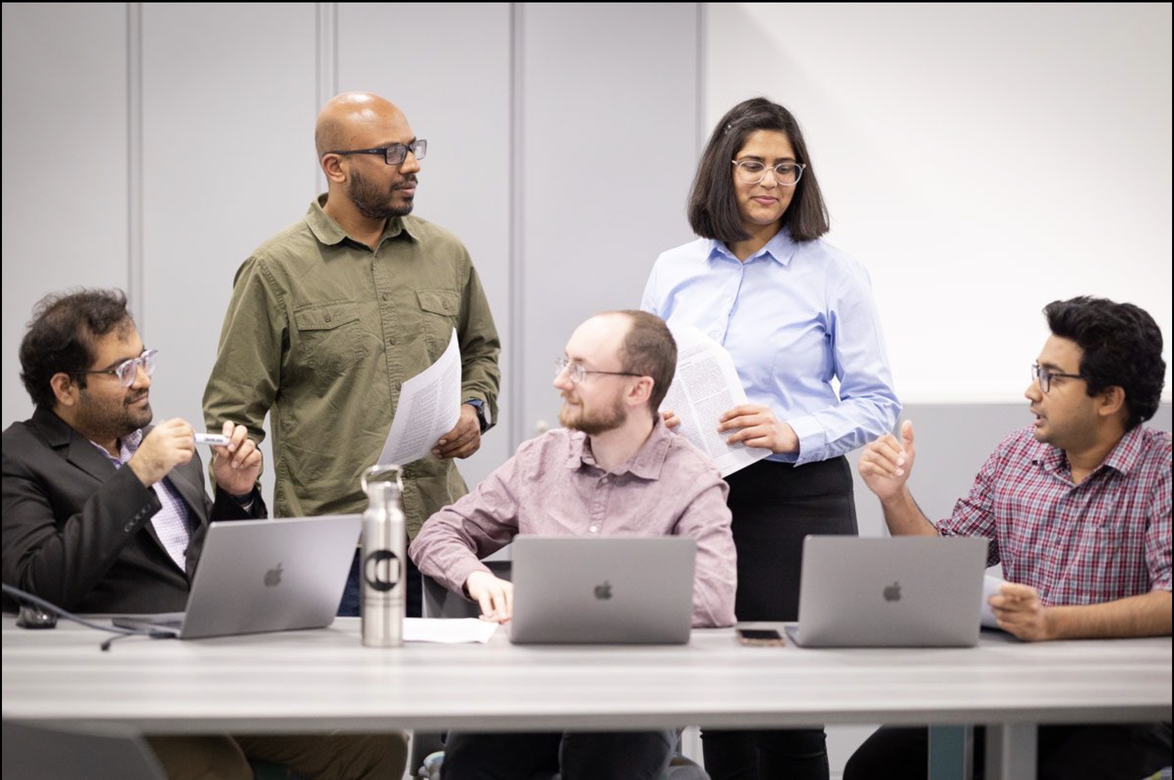 Bimal Viswanath with Grad Students